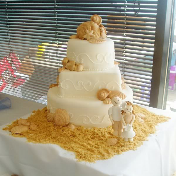 Seashell beach themed wedding cake