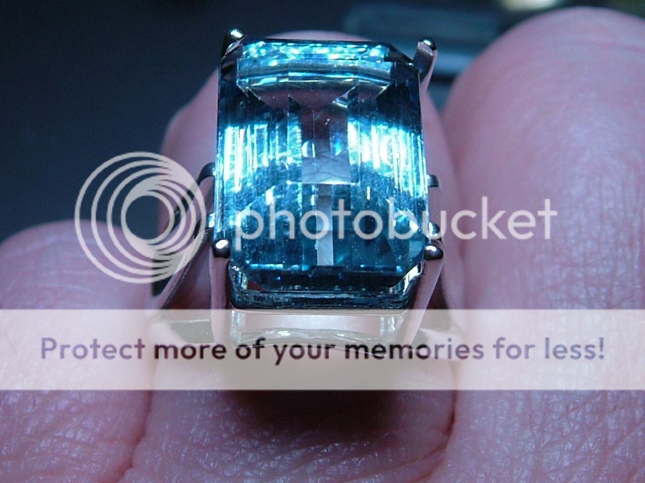 11.70ct Emerald Cut Blue Topaz Solitaire Ring SS 925  