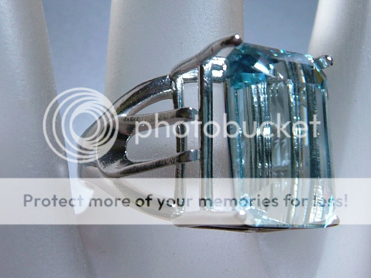 11.70ct Emerald Cut Blue Topaz Solitaire Ring SS 925  